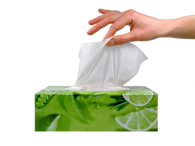 Female hand taking a tissue from a box